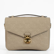 shop 100% authentic second hand Louis Vuitton Tourterelle Monogram Empreinte Pochette Metis Bag on Labellov.com