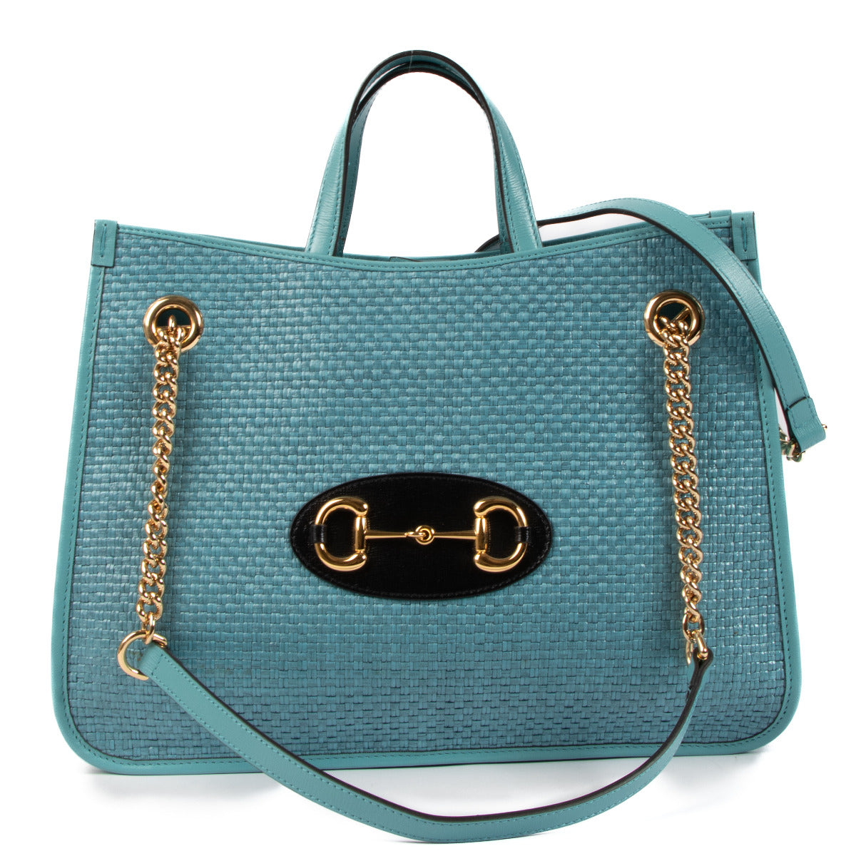 The Gucci Blue Raffia Horsebit 1955 Tote Bag is a stunning blend of heritage and modern style, showcasing the timeless appeal of the brand’s iconic designs while offering a fresh, contemporary twist. This bag is the perfect accessory for those who appreci