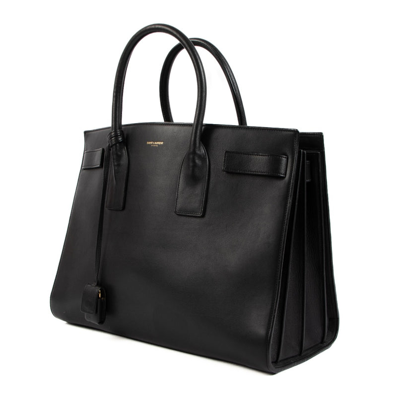 Shop an 100% authentic preloved Saint Laurent Black Leather Sac De Jour Medium Tote Bag on Labellov.com