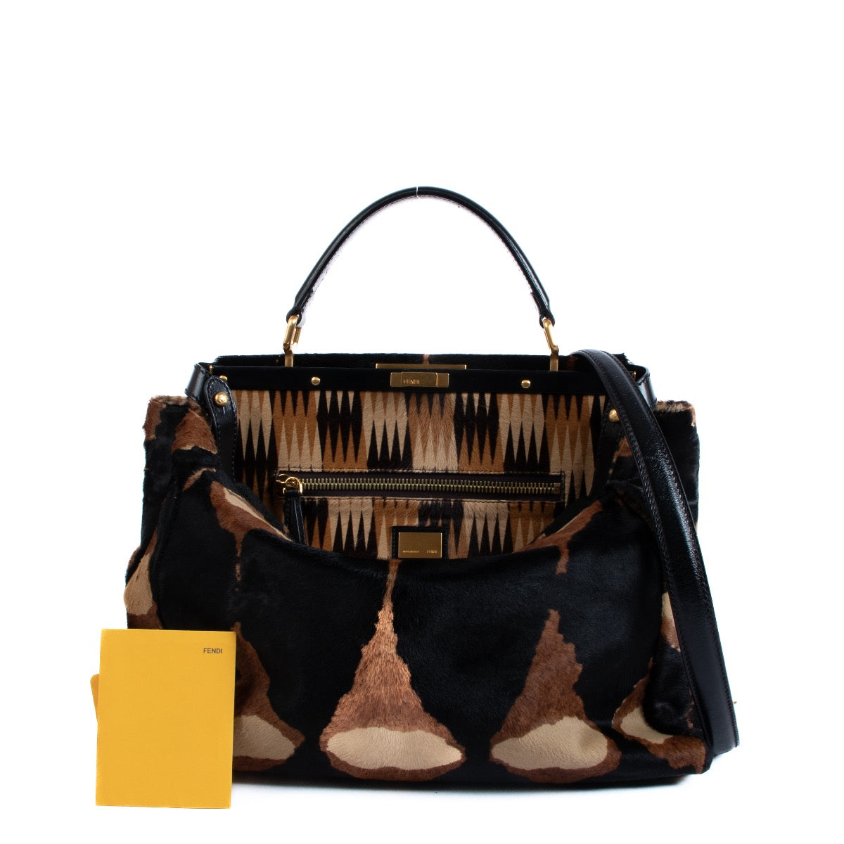 Fendi Peekaboo Bag + Strap. Buy authentic secondhand Fendi bags at Labellov vintage webshop for the lowest price. Koop authentieke tweedehands Fendi tassen bij Labellov vintage webshop aan de laagste prijs.