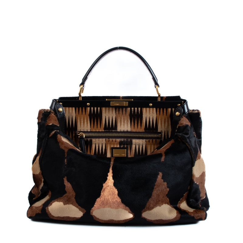 Fendi Peekaboo Bag + Strap. Buy authentic secondhand Fendi bags at Labellov vintage webshop for the lowest price. Koop authentieke tweedehands Fendi tassen bij Labellov vintage webshop aan de laagste prijs.