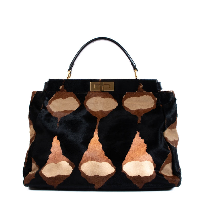 Fendi Peekaboo Bag + Strap. Buy authentic secondhand Fendi bags at Labellov vintage webshop for the lowest price. Koop authentieke tweedehands Fendi tassen bij Labellov vintage webshop aan de laagste prijs.