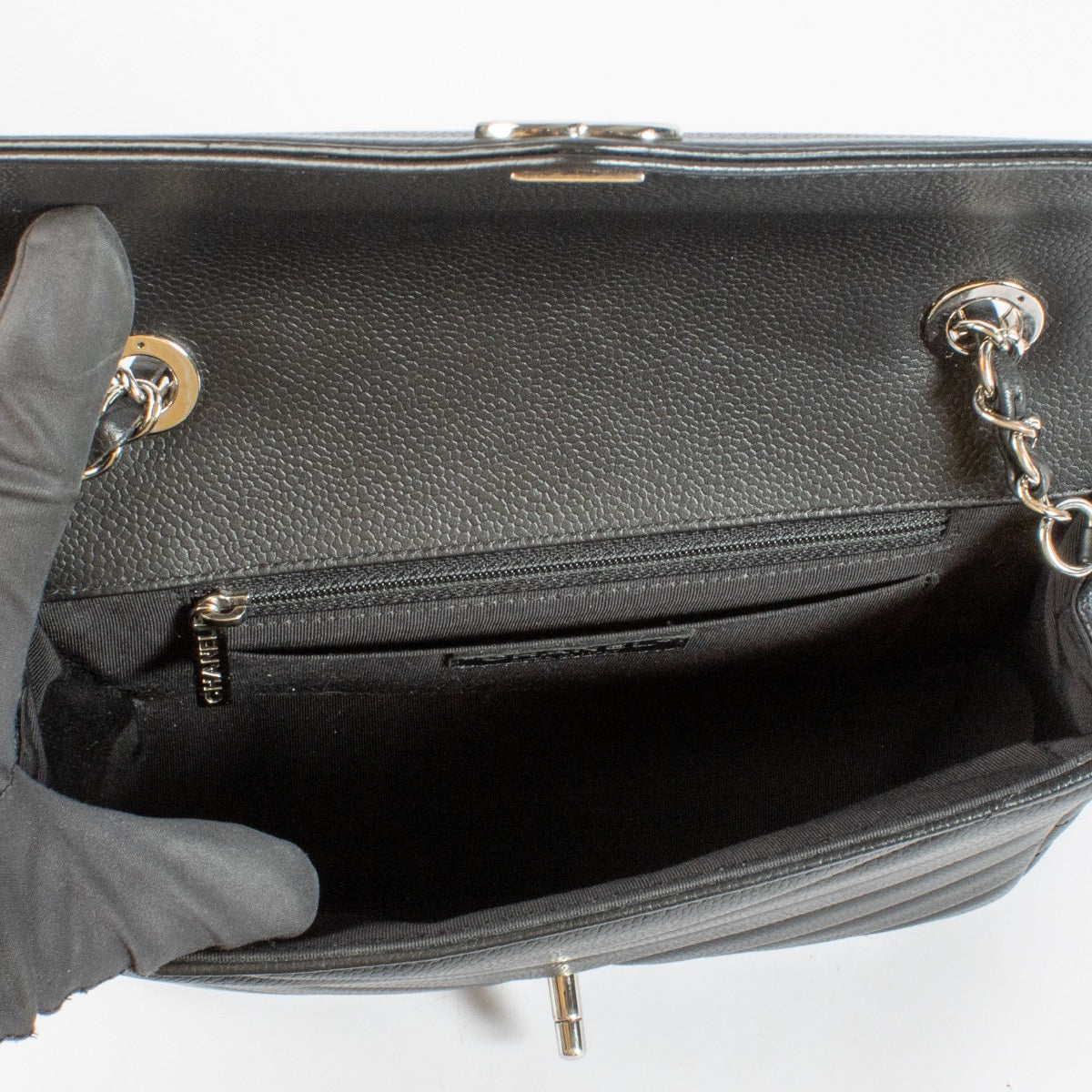Shop 100% authentic second hand Chanel Black Chevron Flap Bag on Labellov.com