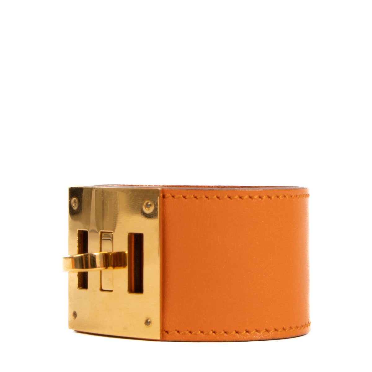 Shop safe online at Labellov in Antwerp, Brussels and Knokke this 100% authentic second hand Hermès Orange Leather Kelly Dog Bracelet