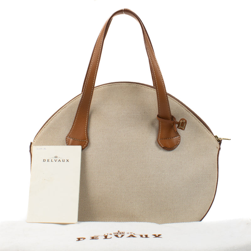 Come and visit the showroom in Antwerp to buy this Delvaux Sourire Toile De Fauve Bag