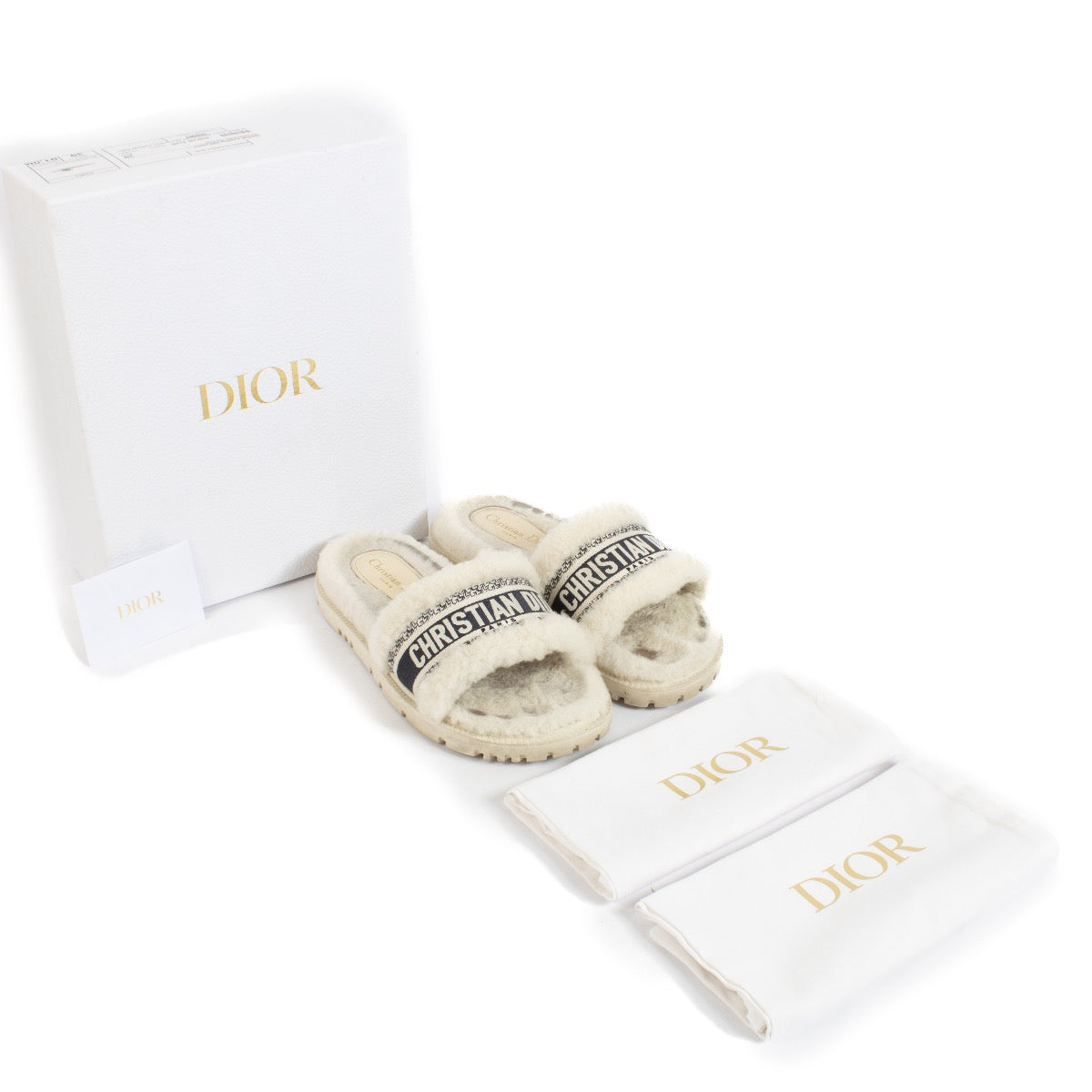 shop 100% authentic second hand Christian Dior White Fur DWay Slides - Size 39 on Labellov.com
