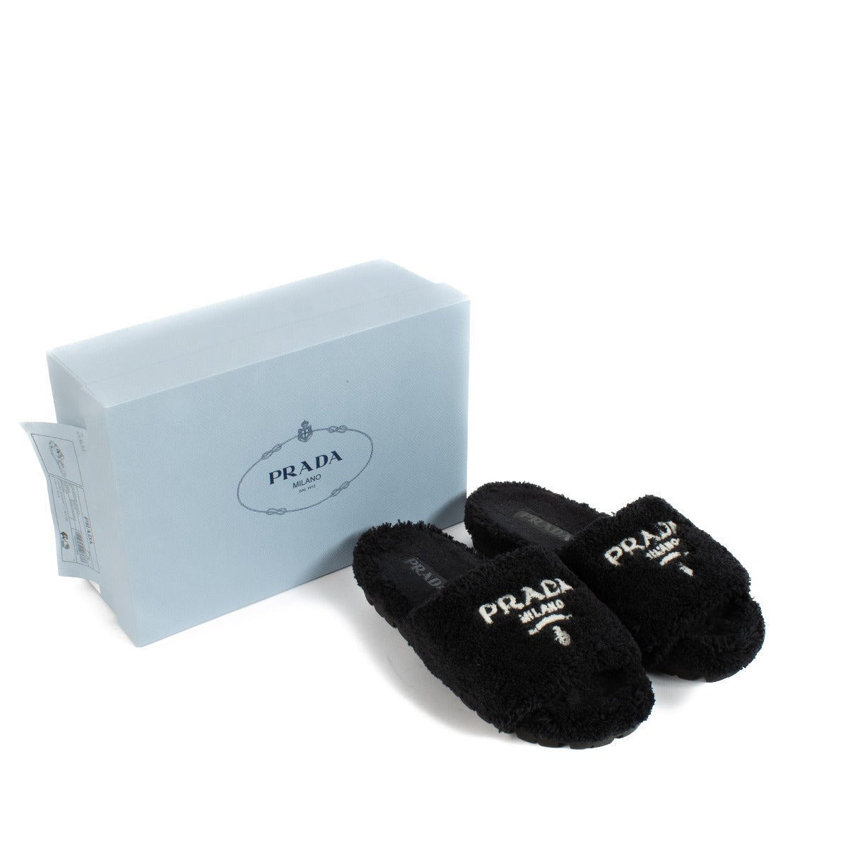 Shop safe online at Labellov in Antwerp, Brussels and Knokke this 100% authentic second hand Prada Black Fussbett Terry Slides - Size 39