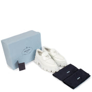 Shop safe online at Labellov in Antwerp, Brussels and Knokke this 100% authentic second hand Prada White Brushed Leather Monolith Platform Loafers - Size 39