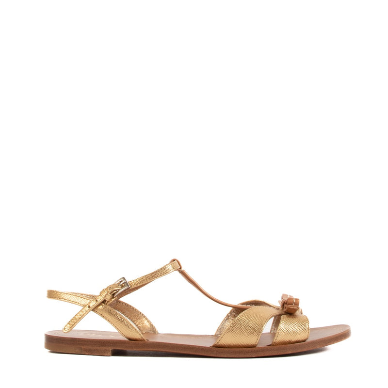 Prada Gold & Tan Leather Bow Sandals - size 36 for the best price at Labellov secondhand luxury in Antwerp. We buy and sell your authentic designer bags online.
