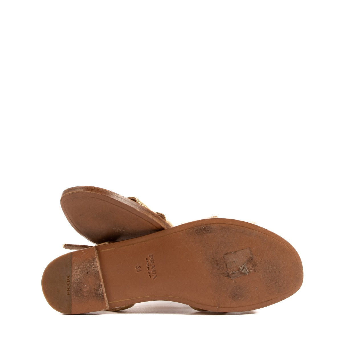 Prada Gold & Tan Leather Bow Sandals - size 36 for the best price at Labellov secondhand luxury in Antwerp. We buy and sell your authentic designer bags online.