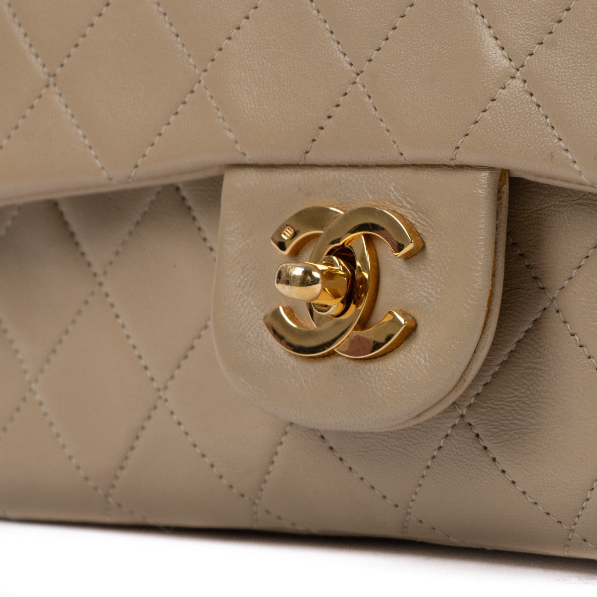 Shop 100% authentic second-hand Chanel Beige Lambskin Small Classic Flap Bag on Labellov.com