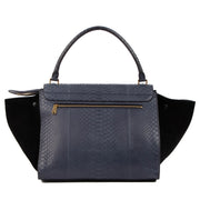 Shop safe online at Labellov in Antwerp, Brussels or Knokke this 100% authentic second hand Celine Blue Python Black Suede Medium Trapeze Bag