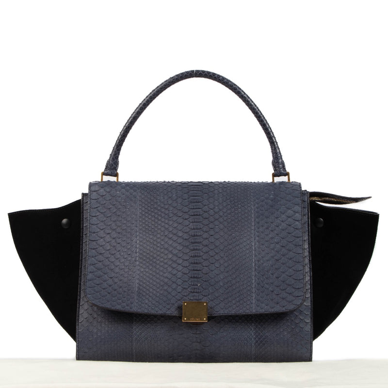 Shop safe online at Labellov in Antwerp, Brussels or Knokke this 100% authentic second hand Celine Blue Python Black Suede Medium Trapeze Bag