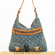Buy an authentic Louis Vuitton Blue Monogram Denim Baggy GM Bag in very good condition at Labellov.com