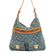 Buy an authentic Louis Vuitton Blue Monogram Denim Baggy GM Bag in very good condition at Labellov.com