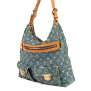 Buy an authentic Louis Vuitton Blue Monogram Denim Baggy GM Bag in very good condition at Labellov.com