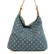 Buy an authentic Louis Vuitton Blue Monogram Denim Baggy GM Bag in very good condition at Labellov.com
