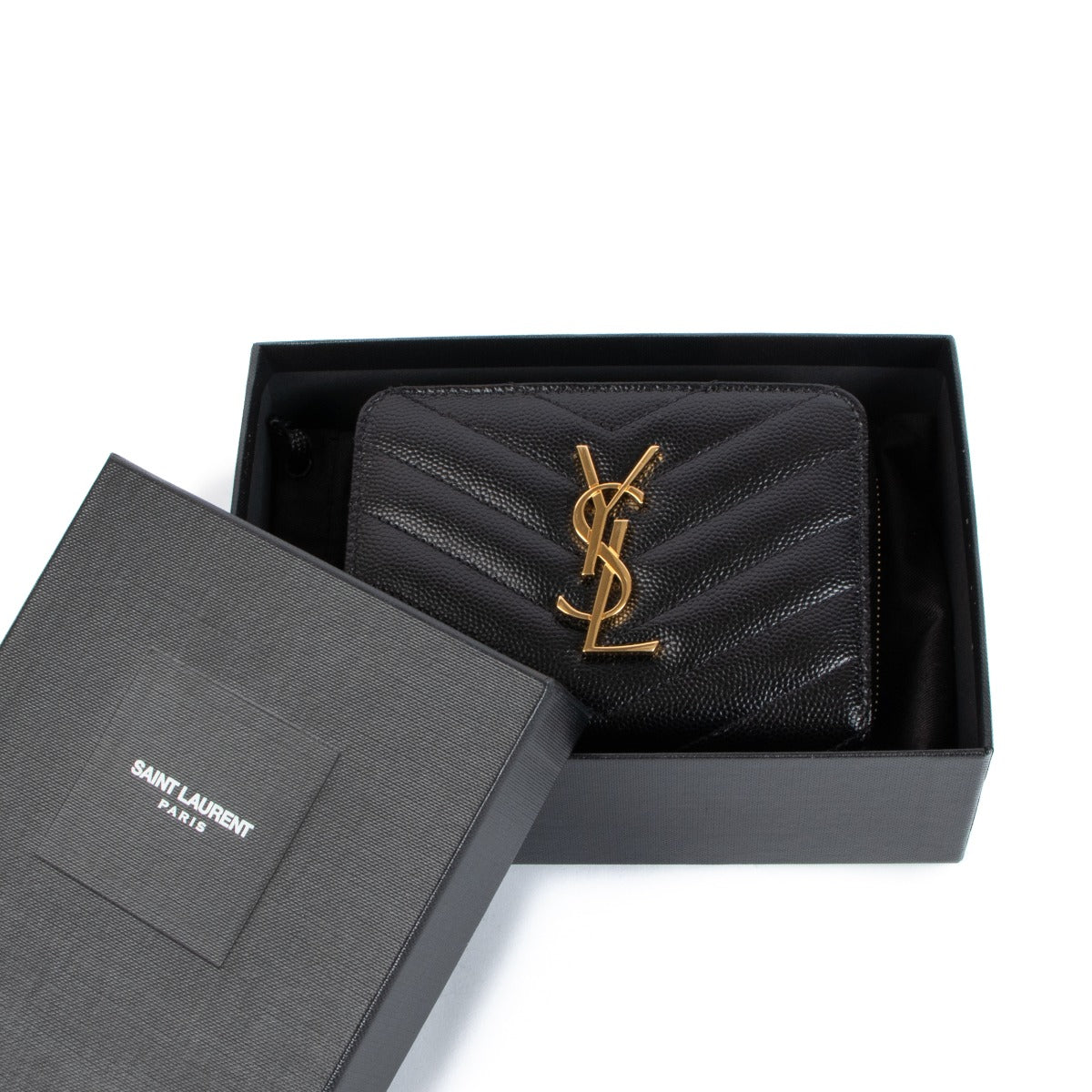 Buy an authentic Saint Laurent Black Cassandre Matelassé Compact Zip Around In Grain de Poudre Wallet on LabelLov.com