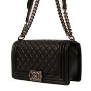 Shop safe online at Labellov in Antwerp, Brussels and Knokke this 100% authentic second hand Chanel Black Quilted Medium Boy Bag