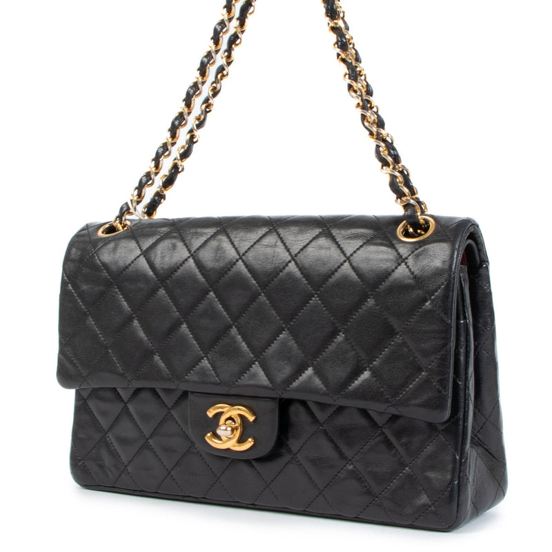 Buy an authentic Chanel Vintage Black Classic Flap Bag on LabelLov.com