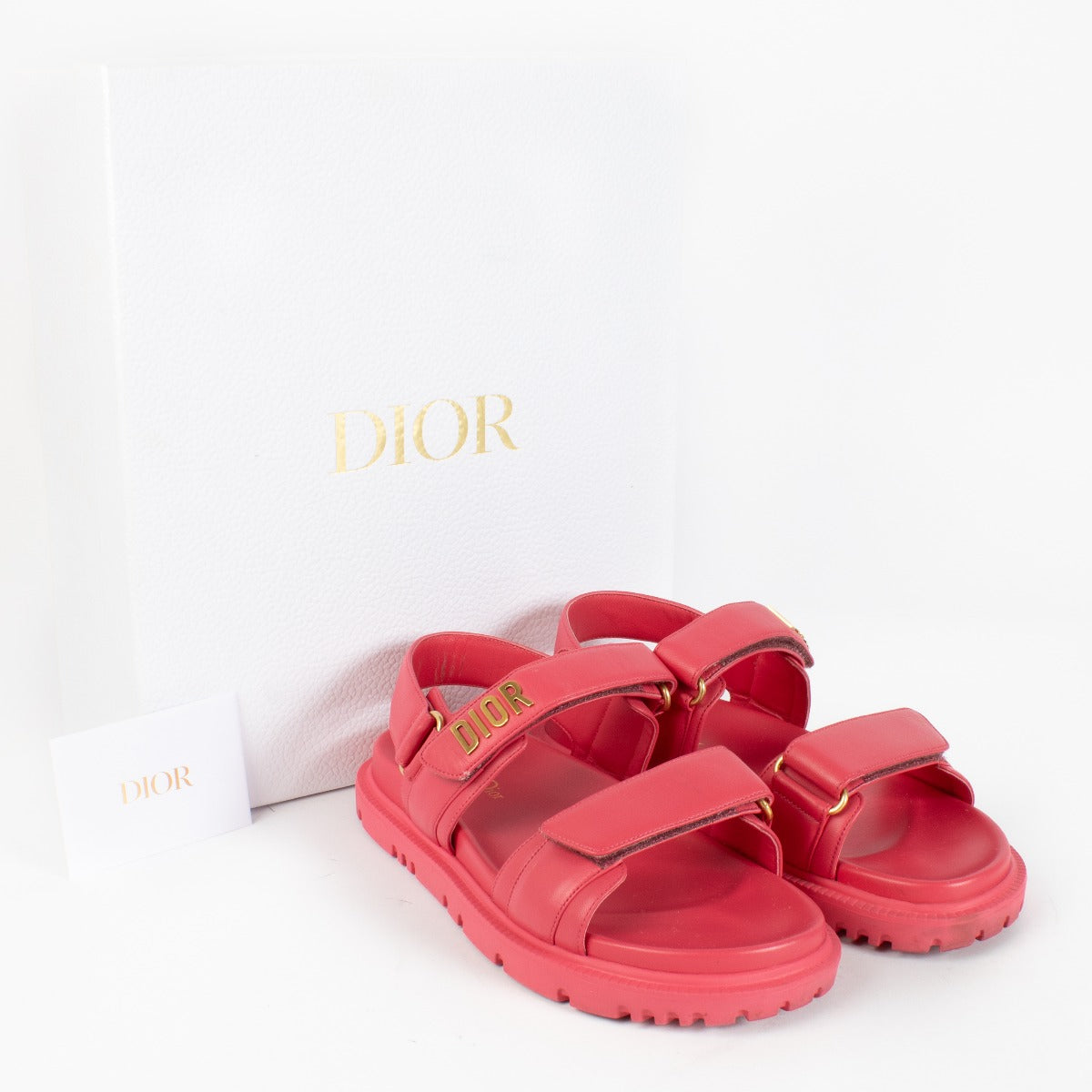 Dior DiorAct pink calfskin leather sandals with gold logo and adjustable straps at Labellov.com