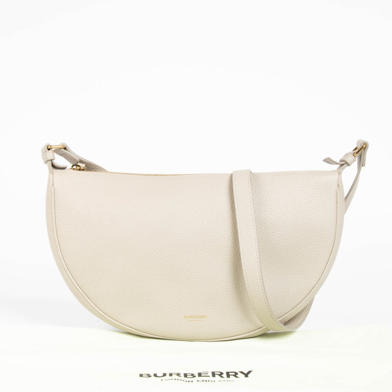 Shop this authentic Burberry Grey Soft Sling Half Moon Bag pre-loved on Labellov.com