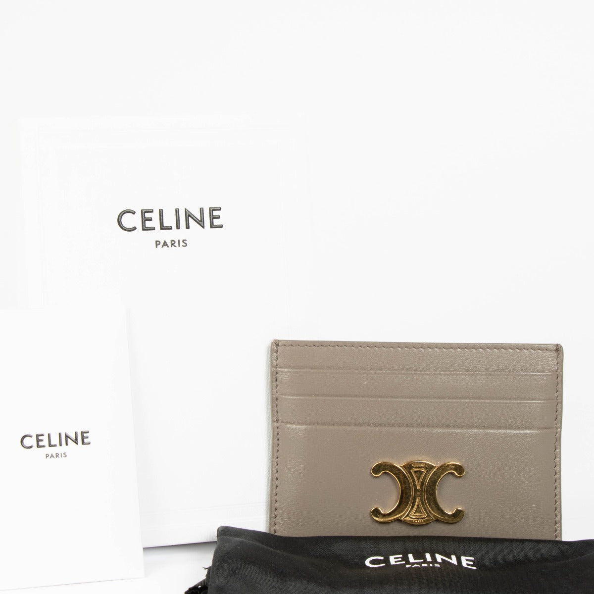 Shop this authentic Celine Pebble Shiny Calfskin Triomphe Card Wallet pre-loved on Labellov.com