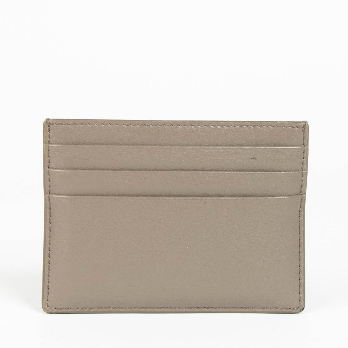 Shop this authentic Celine Pebble Shiny Calfskin Triomphe Card Wallet pre-loved on Labellov.com