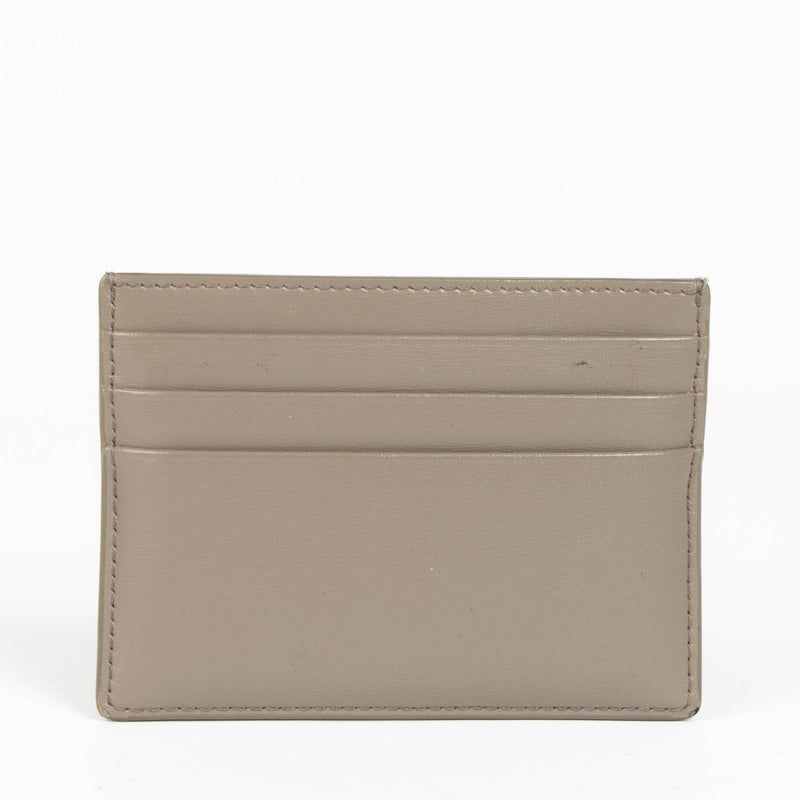 Shop this authentic Celine Pebble Shiny Calfskin Triomphe Card Wallet pre-loved on Labellov.com