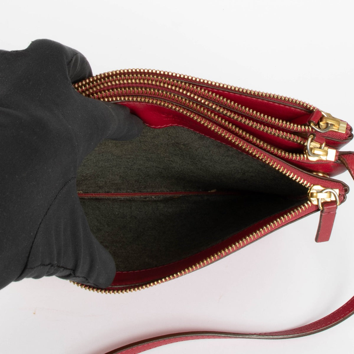 Shop this authentic Celine Raspberry Leather Trio Bag pre-loved on Labellov.com