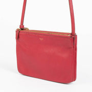 Shop this authentic Celine Raspberry Leather Trio Bag pre-loved on Labellov.com