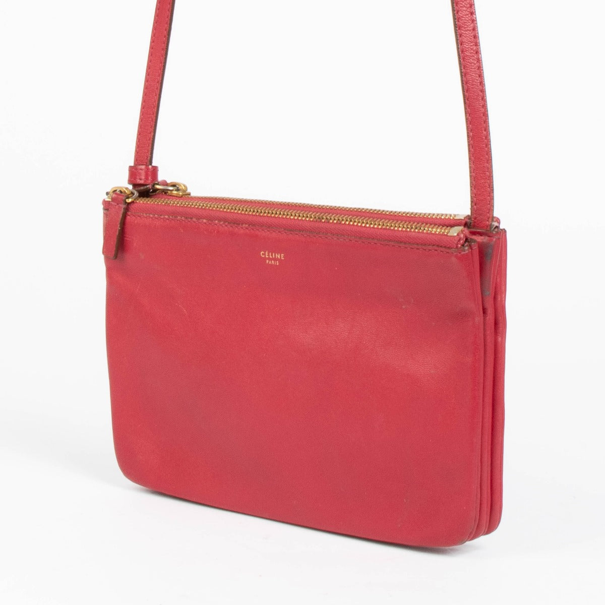 Shop this authentic Celine Raspberry Leather Trio Bag pre-loved on Labellov.com