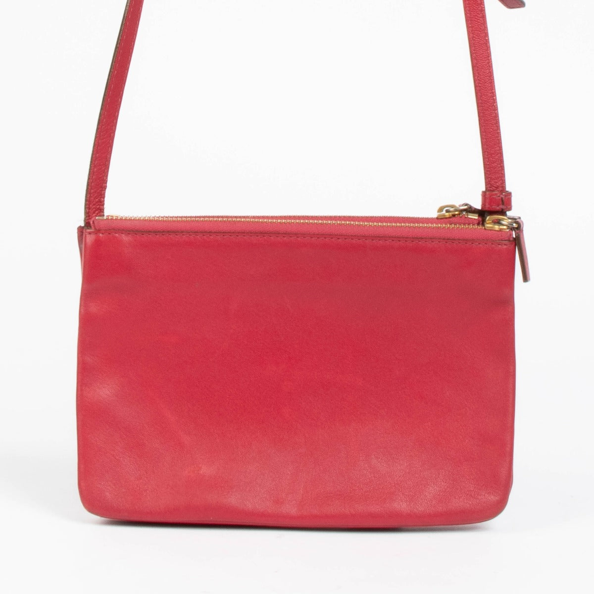 Shop this authentic Celine Raspberry Leather Trio Bag pre-loved on Labellov.com