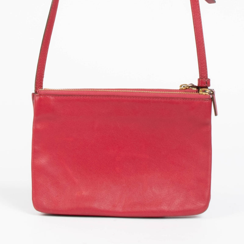 Shop this authentic Celine Raspberry Leather Trio Bag pre-loved on Labellov.com