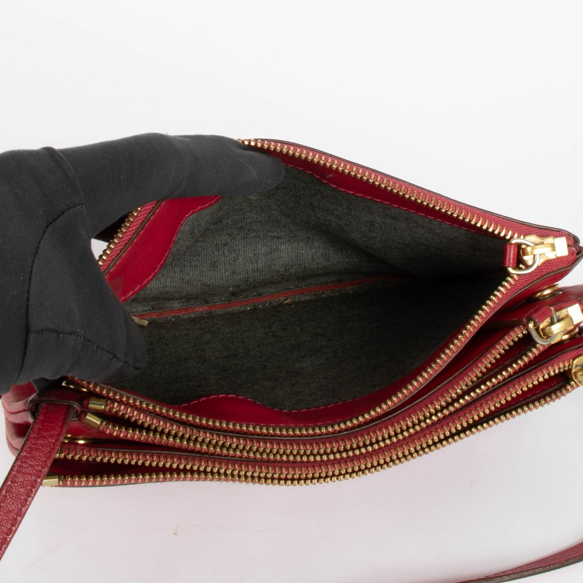 Shop this authentic Celine Raspberry Leather Trio Bag pre-loved on Labellov.com
