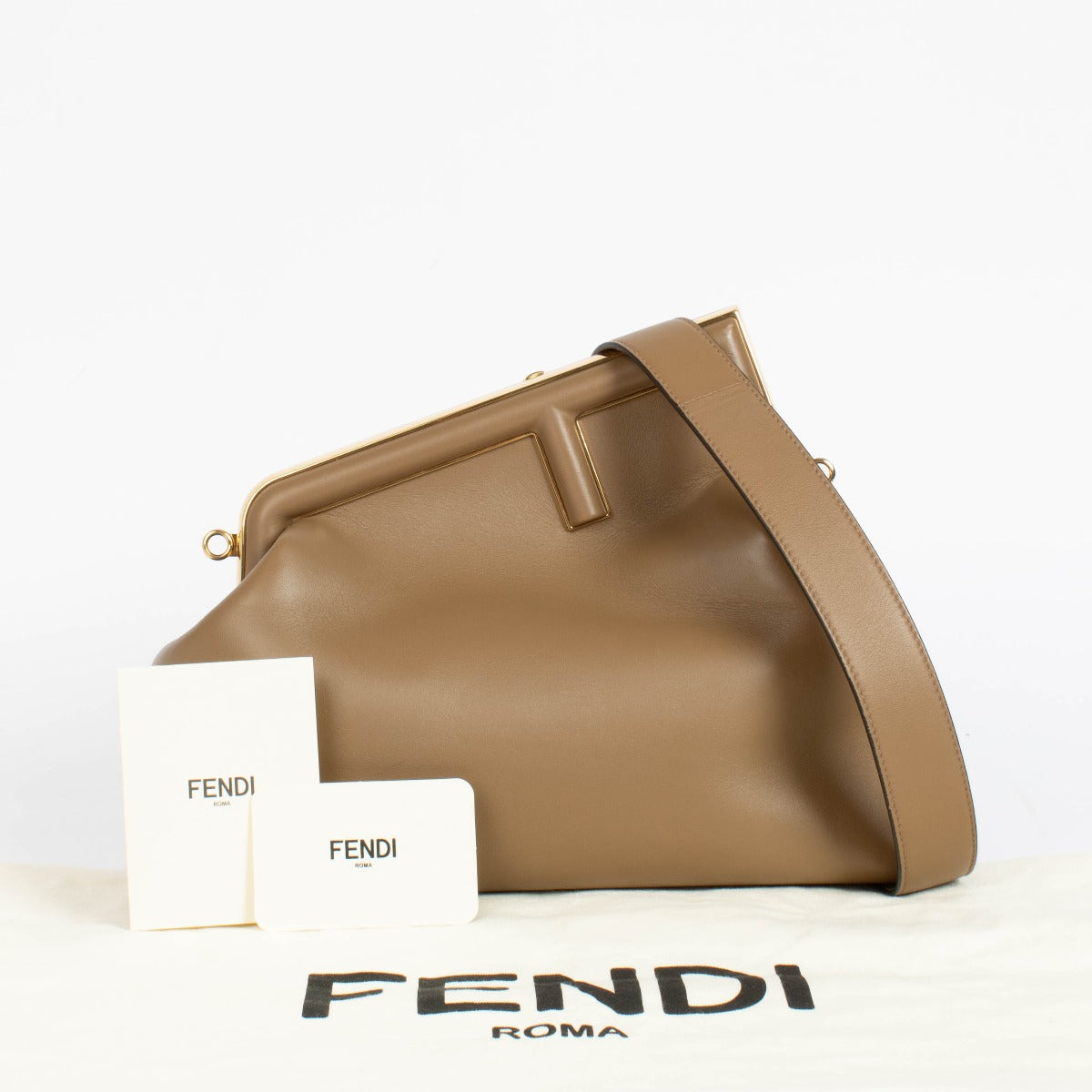 Authentic pre-loved Fendi Camel Leather First Midi Bag on Labellov.com