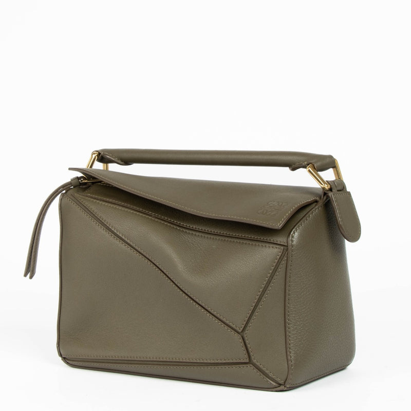 Shop this authentic Loewe Dark Khaki Calfskin Small Puzzle Bag pre-loved on Labellov.com