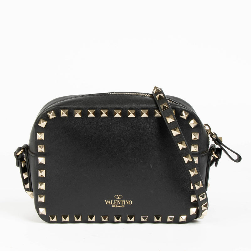 Shop this authentic Valentino Garavani Black Leather Rockstud Camera Bag pre-loved on Labellov.com