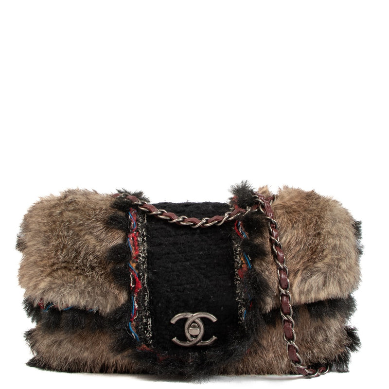 Shop safe online at Labellov in Antwerp, Brussels and Knokke this 100% authentic second hand Chanel Rare Fantasy Faux Fur and Wool Maxi Classic Flap Bag