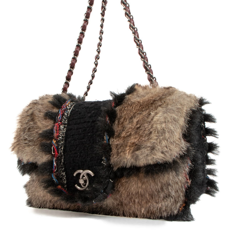 Shop safe online at Labellov in Antwerp, Brussels and Knokke this 100% authentic second hand Chanel Rare Fantasy Faux Fur and Wool Maxi Classic Flap Bag