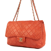 Chanel Coral Red Large Lambskin Leather Classic Single Flap Bag for the best price at Labellov secondhand luxury in Antwerp.
