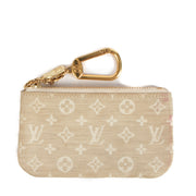 Shop safe online at Labellov in Antwerp, Brussels and Knokke this 100% authentic second hand Louis Vuitton Beige Mini Lin Key Pouch Wallet
