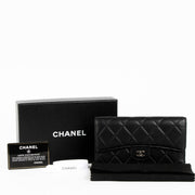 Authentic pre-loved Chanel Black Lambskin Medium Classic Flap Wallet on Labellov.com