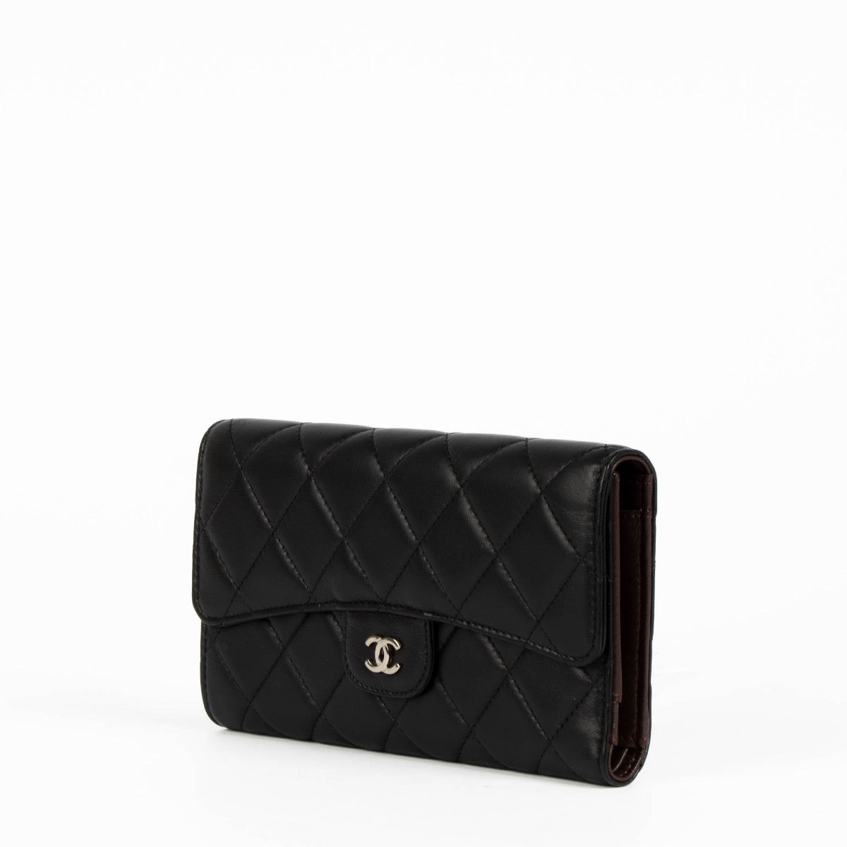 Authentic pre-loved Chanel Black Lambskin Medium Classic Flap Wallet on Labellov.com
