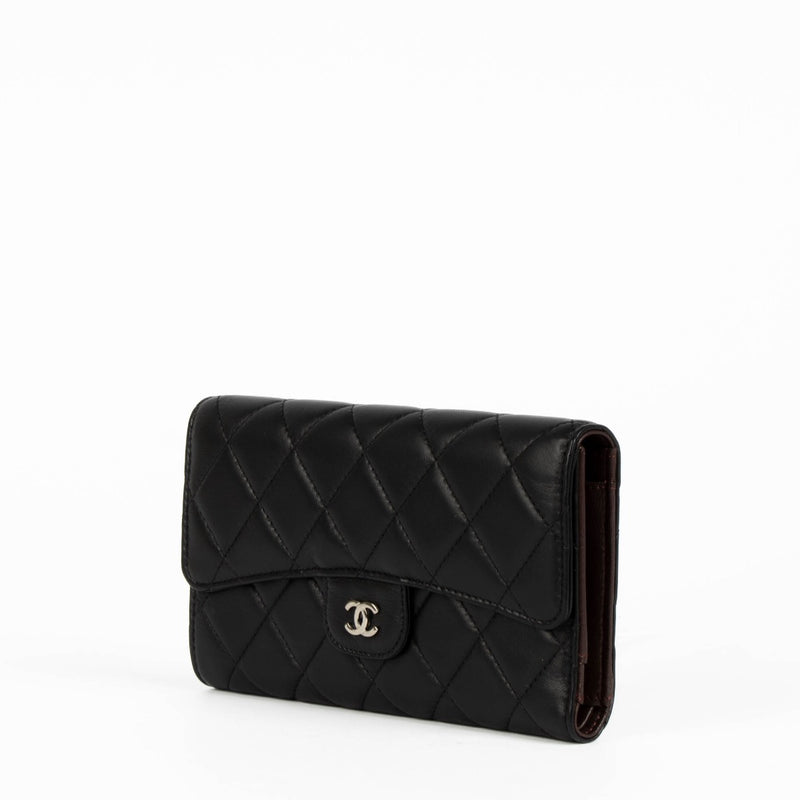 Authentic pre-loved Chanel Black Lambskin Medium Classic Flap Wallet on Labellov.com