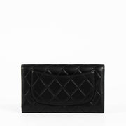 Authentic pre-loved Chanel Black Lambskin Medium Classic Flap Wallet on Labellov.com