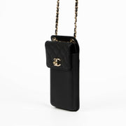 Authentic pre-loved Chanel Black Lambskin Phone Pouch Crossbody Bag on Labellov.com