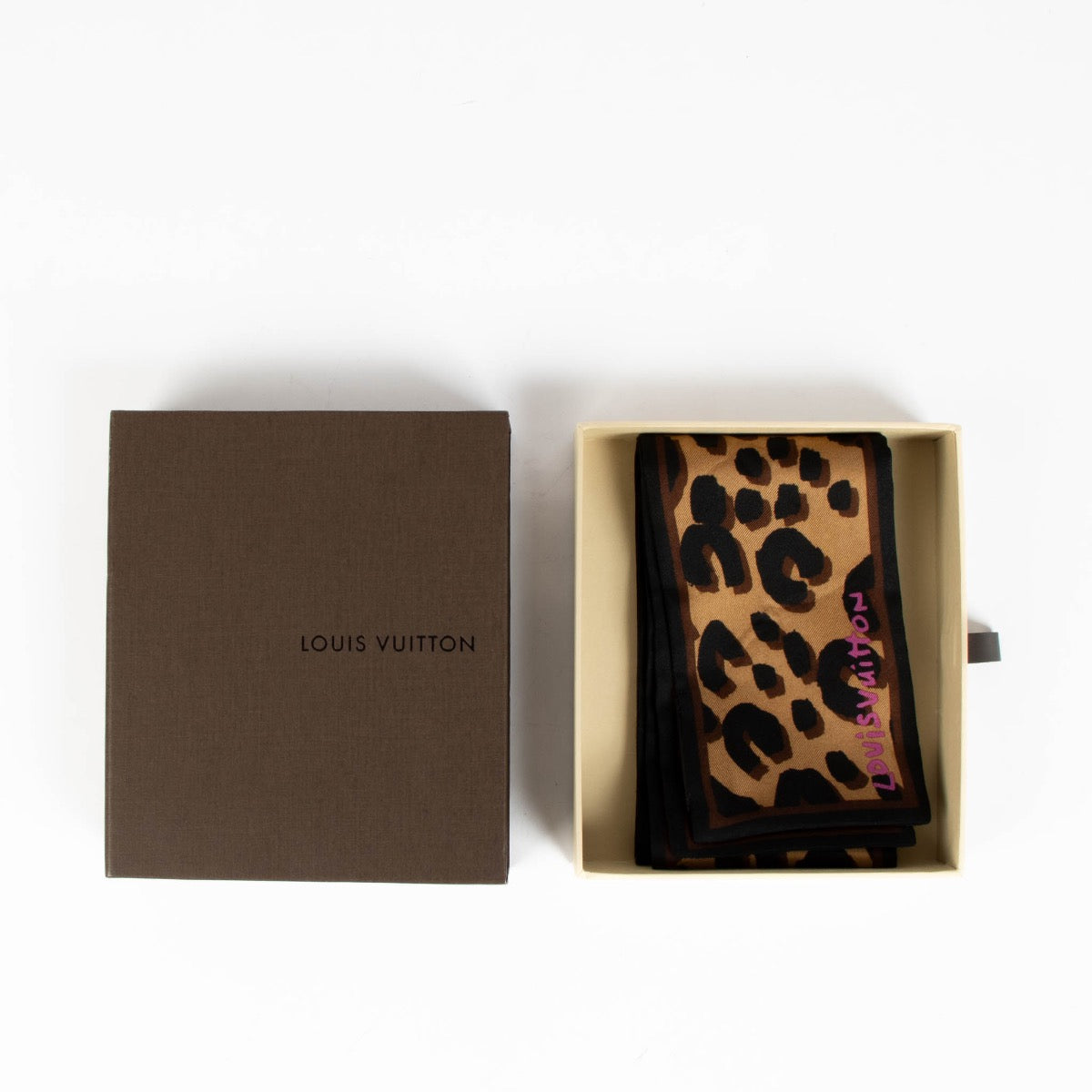 Authentic pre-loved Louis Vuitton Brown Silk Stephen Sprouse Leopard Print Bandeau Scarf on Labellov.com