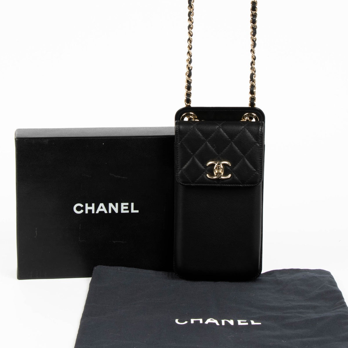Authentic pre-loved Chanel Black Lambskin Phone Pouch Crossbody Bag on Labellov.com