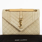 Shop the authentic Saint Laurent Beige Suede Medium Envelope Bag second hand on Labellov.com.